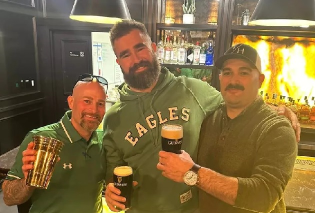 Kelce sinks Guinness and poses